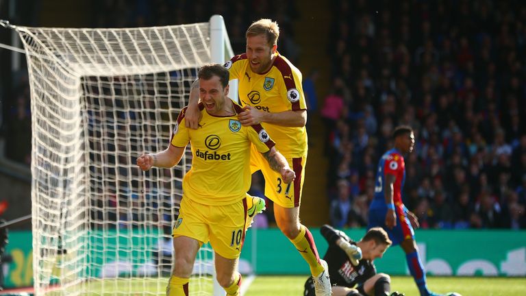 LONDON, ENGLAND - APRIL 29:  Ashley Barnes (L) of Burnley celebrates scoring the opening goal with Scott Arfield during the Premier League match