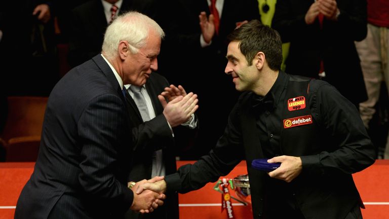 SHEFFIELD, ENGLAND - MAY 05:  Ronnie OSullivan shakes hands with World Snooker chairman Barry Hearn after losing The Dafabet World Snooker Championship fin