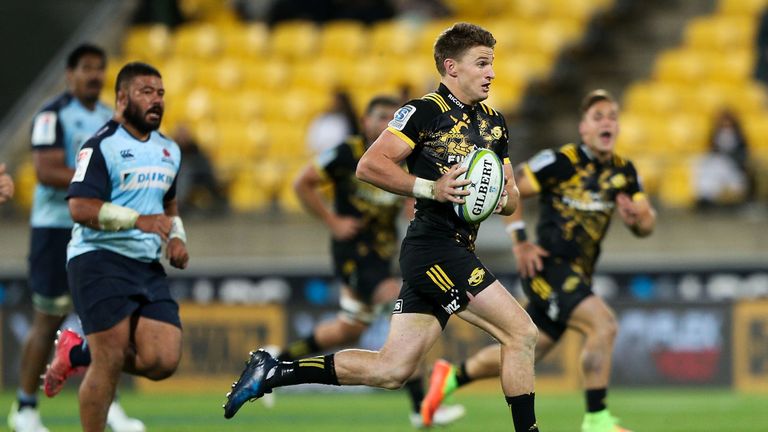 WELLINGTON - APRIL 07 2017:  Beauden Barrett of the Hurricanes makes a break during the Super Rugby match between the Hurricanes and the Waratahs