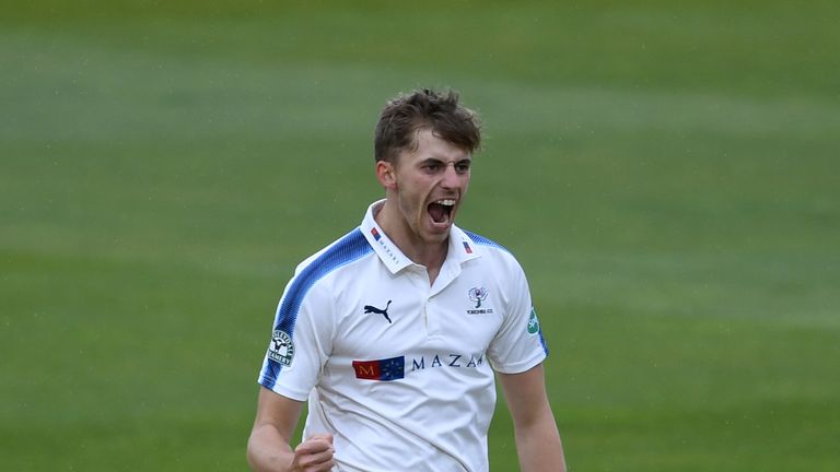 Ben Coad of Yorkshire celebrates dismissing Ian Bell of Warwickshire in the Specsavers County Championship