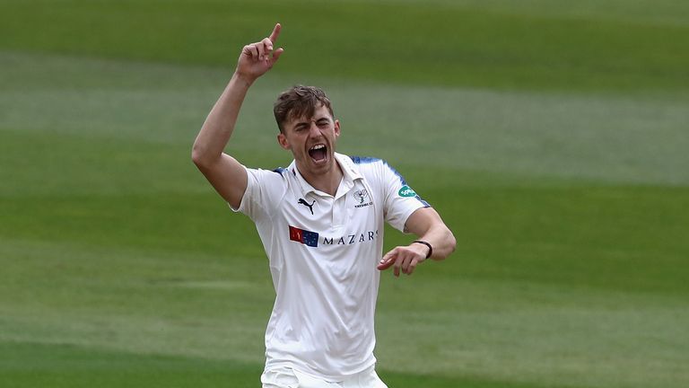 BIRMINGHAM, ENGLAND - APRIL 14:  Ben Coad of Yorkshire celebrates after trapping Rikki Clarke LBW during the Specsavers County Championship One match betwe