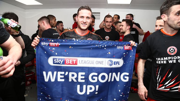 Billy Sharp of Sheffield United celebrates promotion 