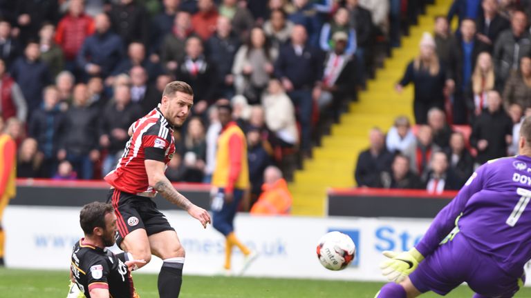 SHEFFIELD, ENGLAND- APRIL 17: Billy Sharp of Sheffield United scores the second goal during the Sky Bet League One match between Sheffield United and Bradf