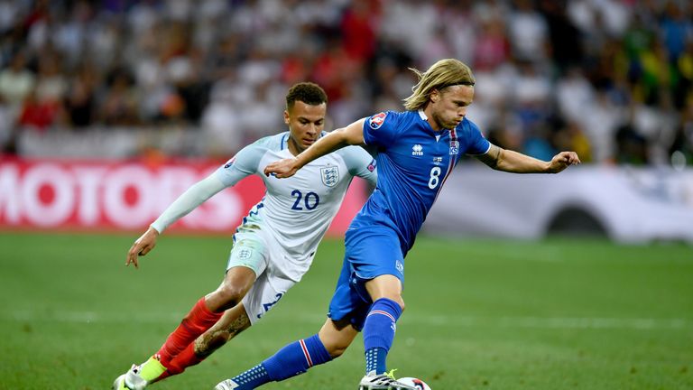 NICE, FRANCE - JUNE 27: Birkir Bjarnason of Iceland and Dele Alli of England compete for the ball during the UEFA EURO 2016 round of 16 match between Engla