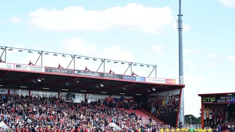 Bournemouth and Middlesbrough players stand for a minutes silence to honour Ugo Ehiogu who died yesterday before the English Premier League football match 
