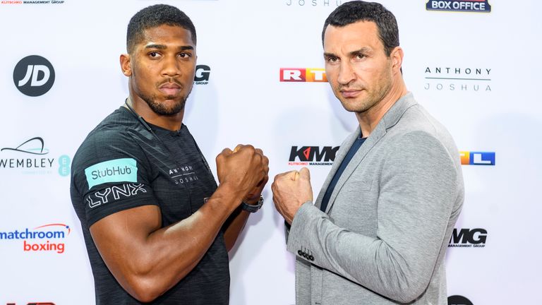 Anthony Joshua and Wladimir Klitschko pose during a photocall at RTL media group mall