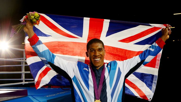 LONDON, ENGLAND - AUGUST 12:  Gold medalist Anthony Joshua of Great Britain celebrates after the medal ceremony for the Men's Super Heavy (+91kg) Boxing fi