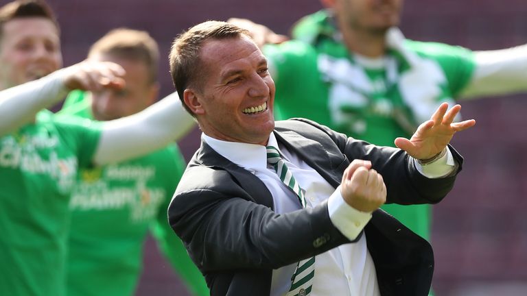 Celtic Manager Brendan Rodgers  celebrates after victory at Hearts