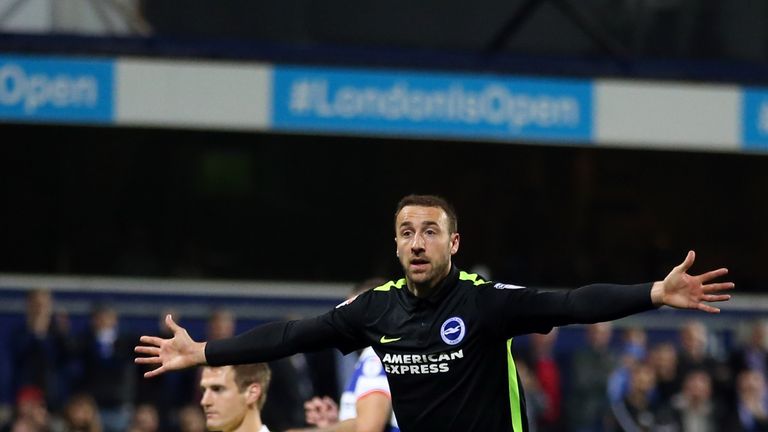 Brighton & Hove Albion's Glenn Murray celebrates scoring his side's first goal of the game during the Sky Bet Championship match at Loftus Road, London.
