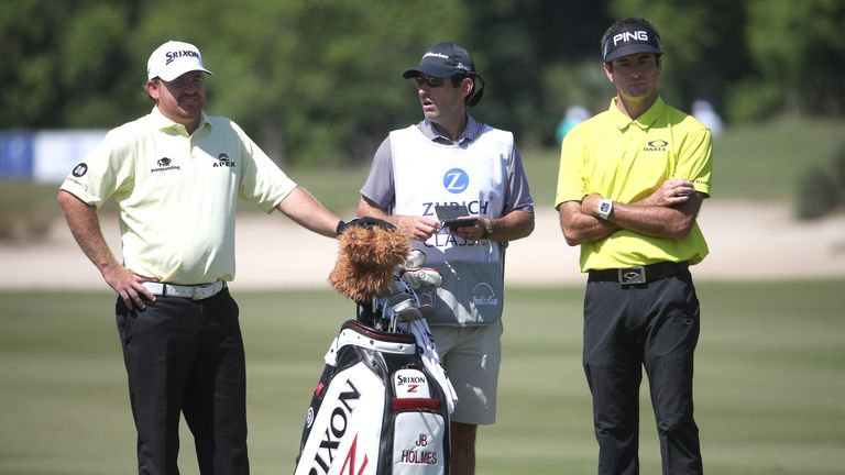 AVONDALE, LA - APRIL 27:  J.B. Holmes and Bubba Watson wait to play their shot on the 11th hole during the first round of the Zurich Classic at TPC Louisia