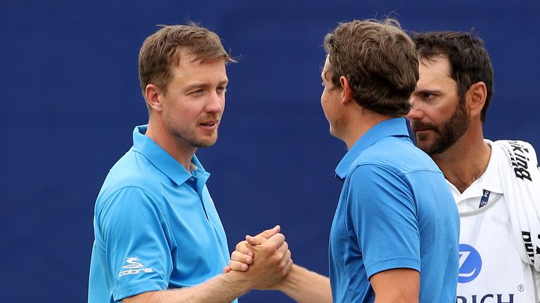 AVONDALE, LA - APRIL 28:  Cameron Smith of Australia and Jonas Blixt of Sweden react after finishing the second round of the Zurich Classic at TPC Louisian