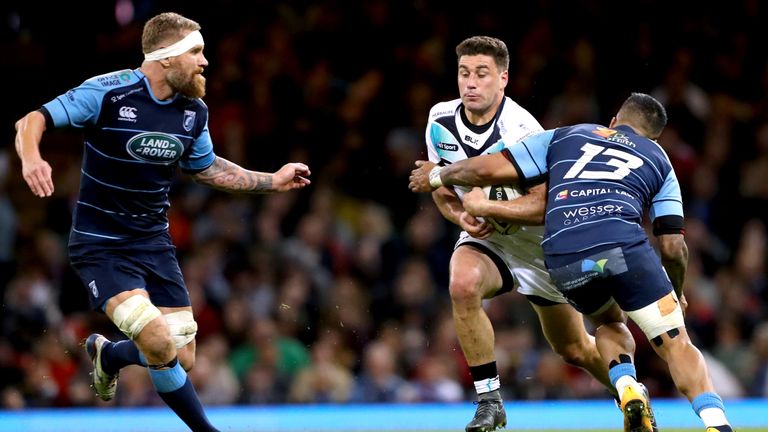 Cardiff Blues' Macauley Cook and Rey Lee-Lo tackle Luke Price