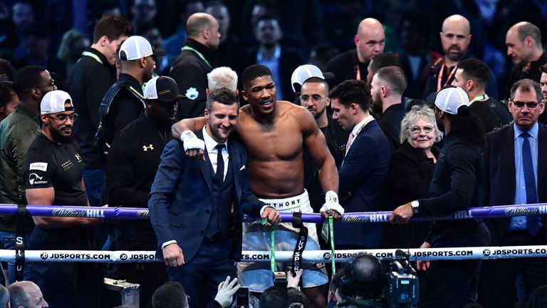 Anthony Joshua celebrates with Carl Froch after victory over Wladimir Klitschko in the IBF and  WBA Heavyweight World Titles