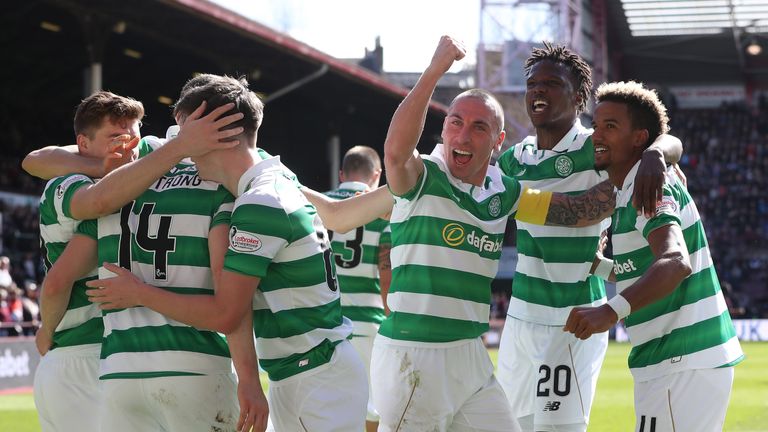 Stuart Armstrong celebrates scoring his side's third goal against Hearts