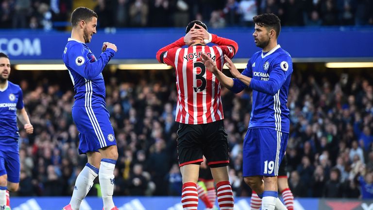 Chelsea's Belgian midfielder Eden Hazard (L) celebrates with Chelsea's Spanish striker Diego Costa 