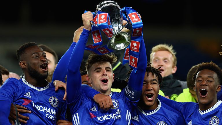 LONDON, ENGLAND - APRIL 26:  Mason Mount of Chelsea lifts the trophy as Chelsea celebrate victory in the FA Youth Cup Final, second leg between Chelsea and