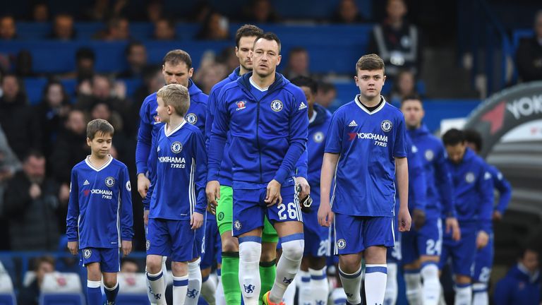 LONDON, ENGLAND - JANUARY 08:  John Terry of Chelsea (C) leads the team out prior to The Emirates FA Cup Third Round match between Chelsea and Peterborough
