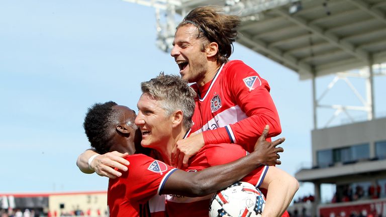 astian Schweinsteiger #31 of Chicago Fire is congratulated by David Accam #11 and Joao Meira #66 after scoring a goal in the fi
