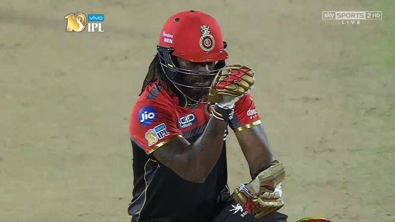 Chris Gayke celebrates reaching his half-century for RCB