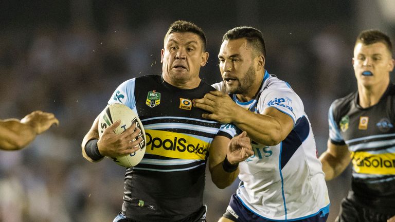 SYDNEY, NEW SOUTH WALES - APRIL 22:  Chris Heighington  of the Sharks is tackled during the round eight NRL match between the Cronulla Sharks and the Gold 