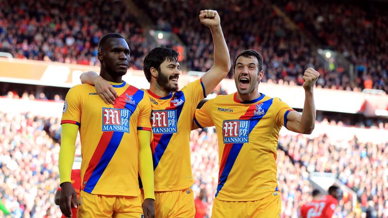 Crystal Palace's Christian Benteke celebrates scoring his side's second goal of the game with his team-mates during the Premier League match at Anfield, Li
