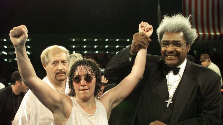 3 Mar 2000:  Promoter Don King holds up the arm of Christy Martin after defeating Belinda Laracuente by way of unanimous decision after 8 rounds