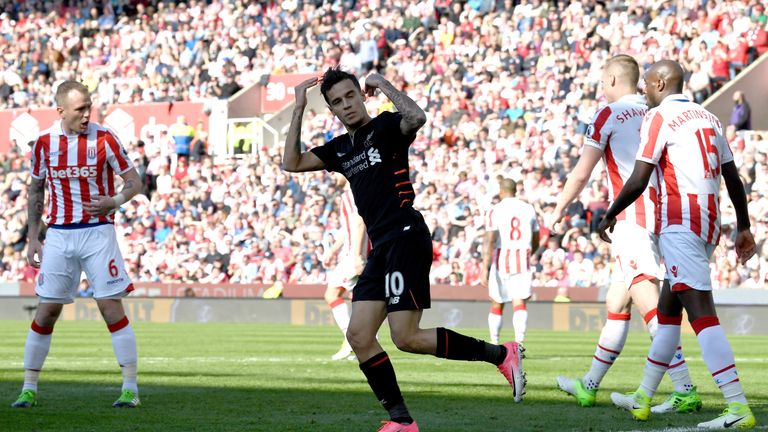 STOKE ON TRENT, ENGLAND - APRIL 08: Philippe Coutinho of Liverpool celebrates scoring his sides first goal during the Premier League match between Stoke Ci
