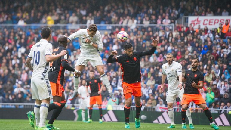 MADRID, SPAIN - APRIL 29:  Cristiano Ronaldo of Real Madrid scores Real's opening goal  during the La Liga match between Real Madrid CF and Valencia CF