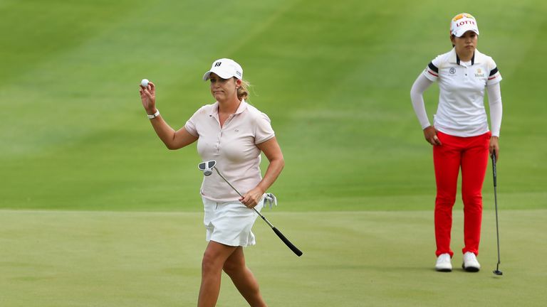 KAPOLEI, HI - APRIL 15:  Cristie Kerr reacts to a par putt on the ninth green, alongside Su-Yeon Jang of Republic of Korea, during the final round of the L