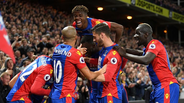 LONDON, ENGLAND - APRIL 10:  Yohan Cabaye of Crystal Palace (obscured) is mobbed by team mates as he celebrates scoring their second goal during the Premie