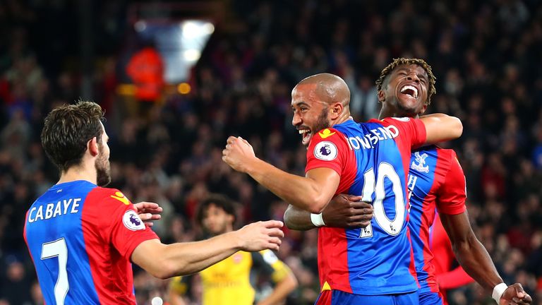 Andros Townsend of Crystal Palace (10) celebrates with Wilfried Zaha and Yohan Cabaye as he scores their first goal 