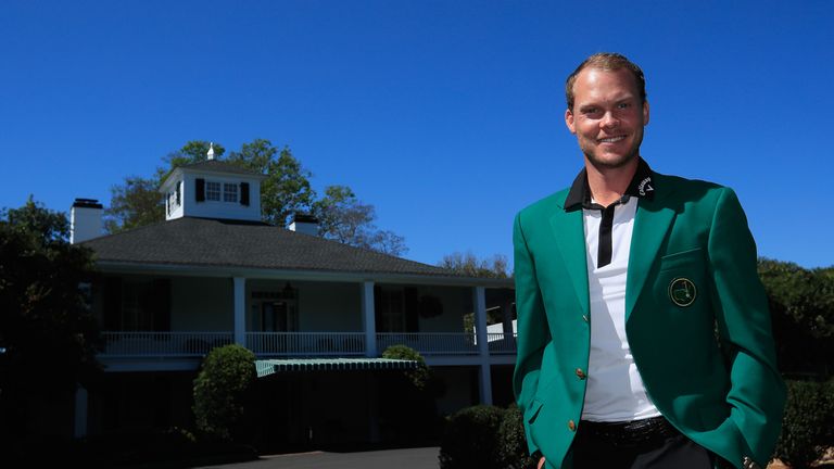 AUGUSTA, GA - APRIL 02:  Danny Willett of England, the defending champion, is pictured wearing his green jacket in front of the clubhouse during the Drive,