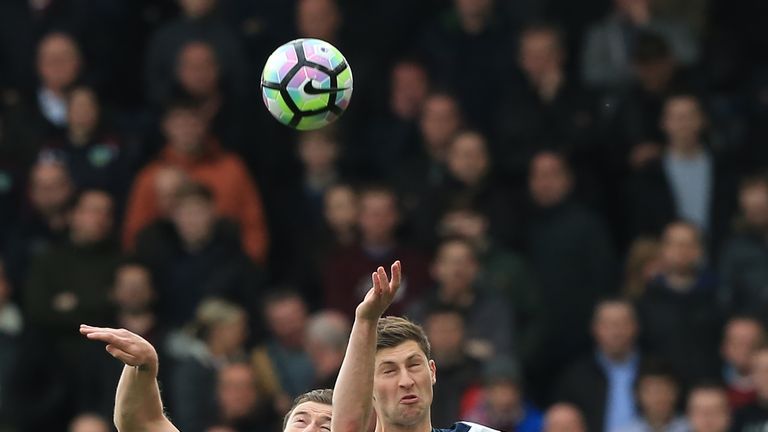 Burnley's English striker Ashley Barnes (L) vies with Tottenham Hotspur's Welsh defender Ben Davies during the English Premier League football match betwee
