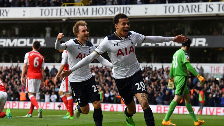 Tottenham Hotspur's English midfielder Dele Alli (R) celebrates scoring the opening goal with Tottenham Hotspur's Danish midfielder Christian Eriksen (2R) 
