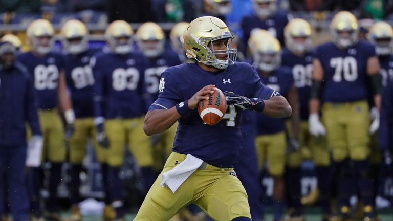 SOUTH BEND, IN - NOVEMBER 19: DeShone Kizer #14 of the Notre Dame Fighting Irish passes against the Virginia Tech Hokies at Notre Dame Stadium on November 