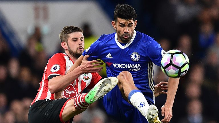 Southampton's English defender Jack Stephens (L) vies with Chelsea's Brazilian-born Spanish striker Diego Costa during the English Premier League football 