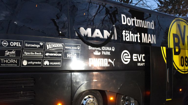 Borussia Dortmund's damaged bus is pictured after an explosion prior to their Champions League game with Monaco