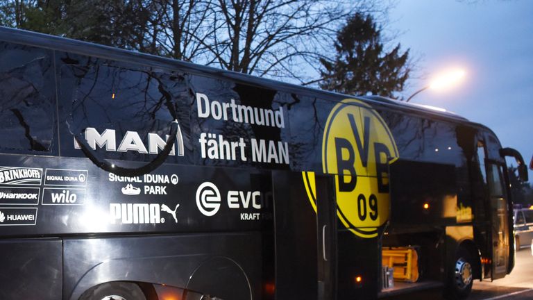 Borussia Dortmund's damaged bus is pictured after an explosion some 10km away from the stadium prior to the UEFA Champions League 1st leg quarter-final foo