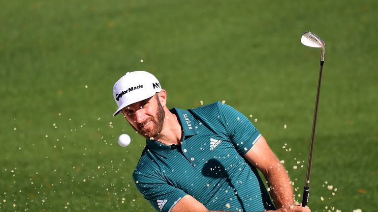 AUGUSTA, GA - APRIL 04:  Dustin Johnson of the United States plays a shot from a bunker on the second hole during a practice round prior to the start of th