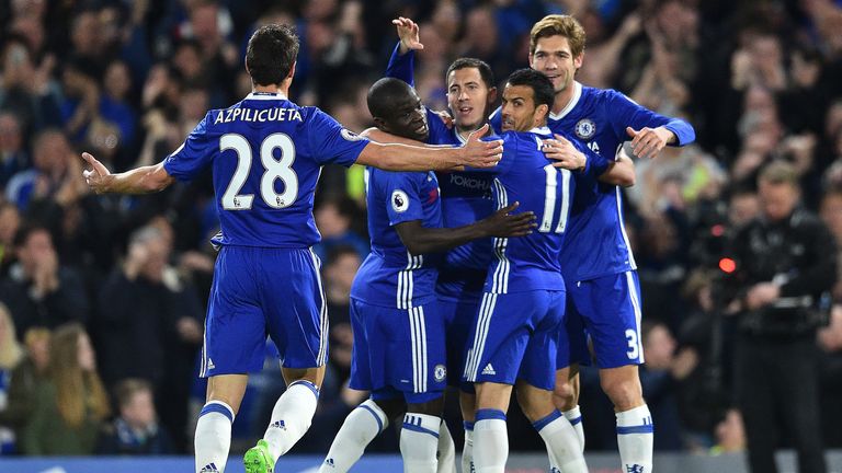 Eden Hazard is mobbed by team-mates after scoring Chelsea's opening goal against Manchester City