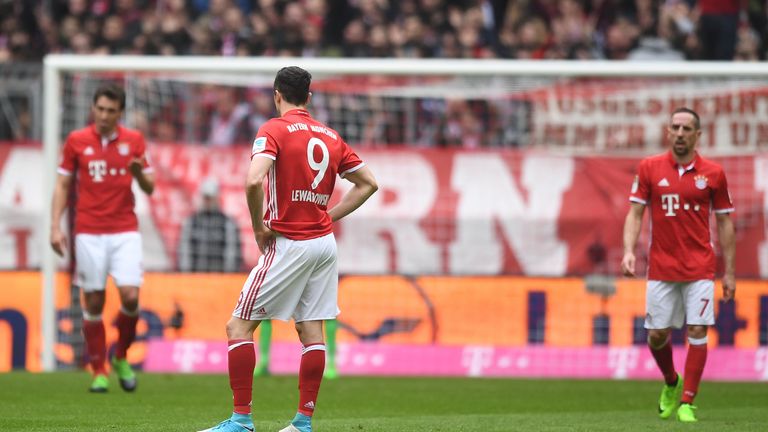 MUNICH, GERMANY - APRIL 22: Robert Lewandowski of Bayern Muenchen reacts after the second goal of FSV Mainz 05 during the Bundesliga match between Bayern M