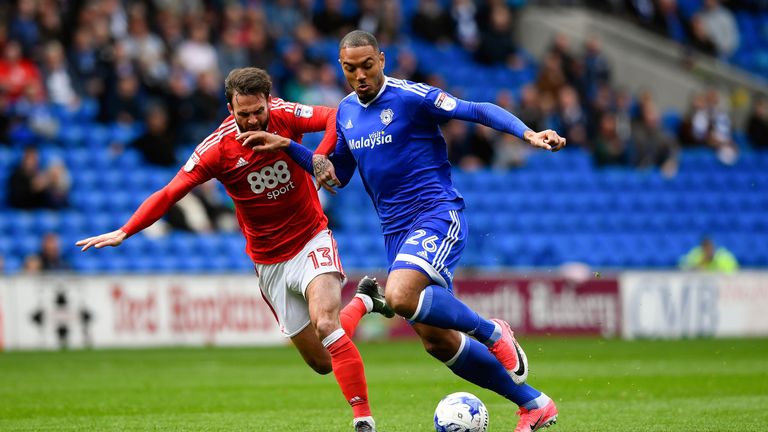 Kenneth Zohore  is challenged by Daniel Fox during the Sky Bet Championship match at Cardiff City Stadium 