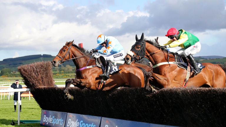 Jockey Robbie Power on board Fox Norton (nearside) wins the BoyleSports Champion Chase 