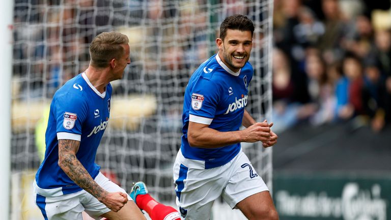 Gareth Evans scores the opening goal of the game between Notts County and Portsmouth
