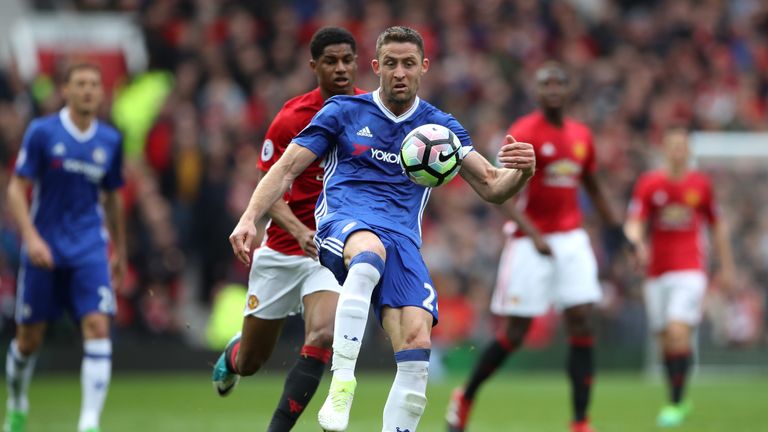 Chelsea's Gary Cahill (right) amd Manchester United's Marcus Rashford battle for the ball during the Premier League match at Old Trafford, Manchester.