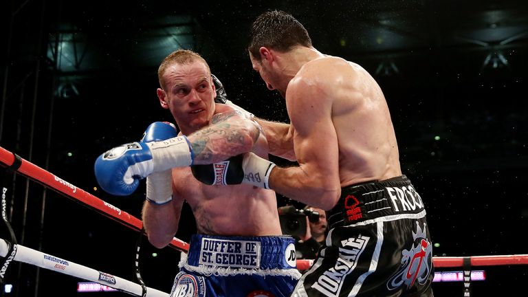 LONDON, ENGLAND - MAY 31:  George Groves in action with Carl Froch in their IBF and WBA World Super Middleweight bout at Wembley Stadium on May 31, 2014 in