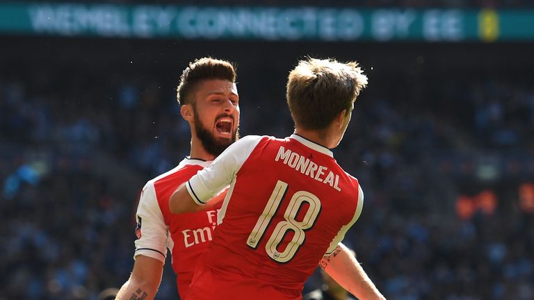 Nacho Monreal of Arsenal celebrates scoring his sides first goal with Olivier Giroud