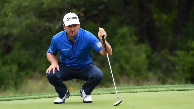 SAN ANTONIO, TX - APRIL 20:  Graeme McDowell of Northern Ireland lines up a putt during the first round of the Valero Texas Open at TPC San Antonio AT&T Oa