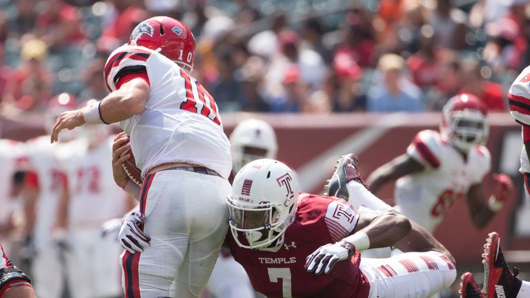 PHILADELPHIA, PA - SEPTEMBER 10: Haason Reddick #7 of the Temple Owls sacks Joe Carbone #10 of the Stony Brook Seawolves in the second quarter at Lincoln F