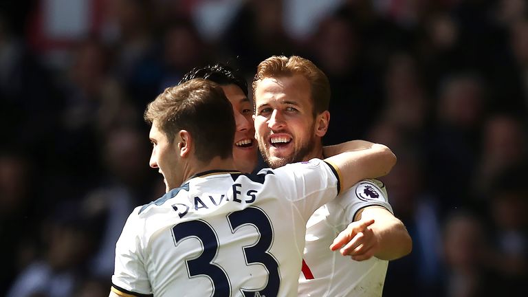 Harry Kane celebrates with team-mates after scoring a third goal for Tottenham